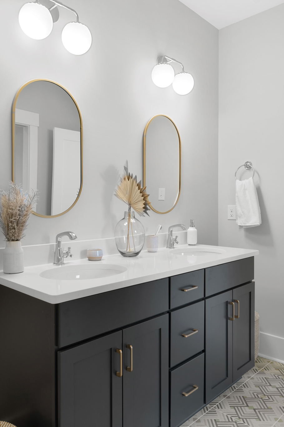 Black shaker double vanity with brass hardware