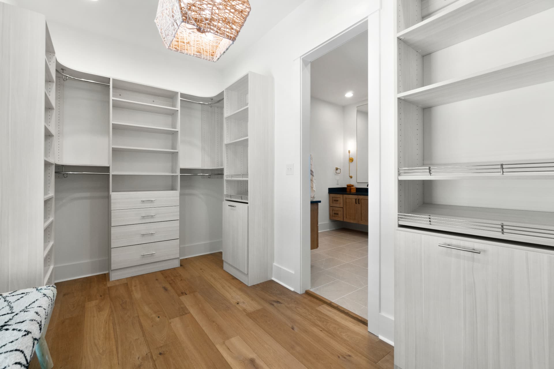 Walk-in closet with built-in drawers and shelving